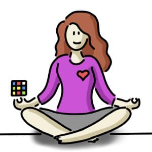 Love it - eine Frau, die meditiert mit einem gelösten Rubiks Zauberwürfel in der Hand
